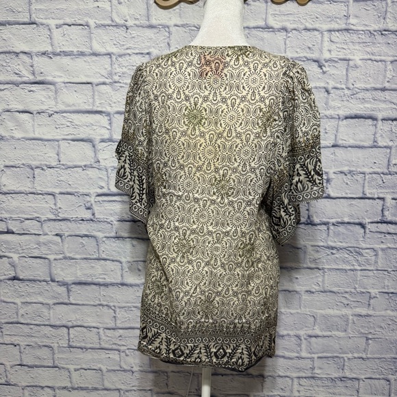 Bell silk boho print with gold chain tassel tie
Bell by Alicia Bell
Silk/cotton - Picture 2 of 9